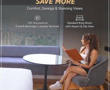Premium Larger King Room with Airport View and City View: Enjoy 15% discount on F&B and Laundry services.