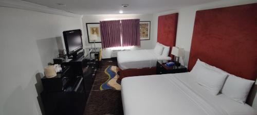 King Room with Two King Beds - Non-Smoking