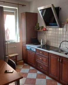 Three-Bedroom Apartment with Balcony