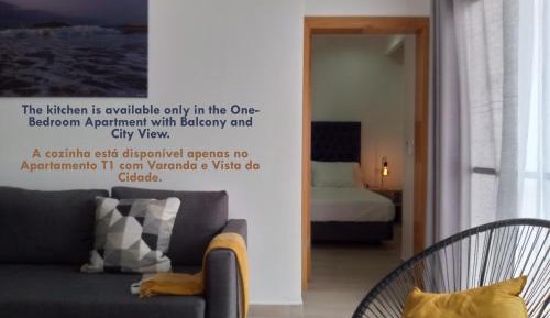 One-Bedroom Apartment with Balcony and City View