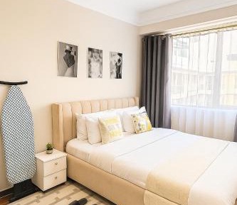 One-Bedroom Apartment with Balcony and City View