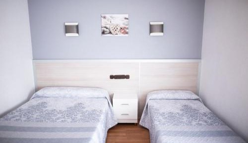 Triple Room (1 double + 1 single bed)