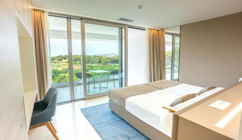 One-Bedroom Apartment with Balcony and Sea View