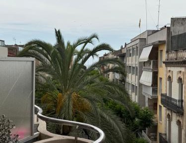 One-Bedroom Apartment with Balcony and City View