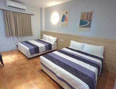 Quadruple Room with Private Bathroom