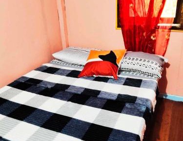 Economy Quadruple Room with Shared Bathroom