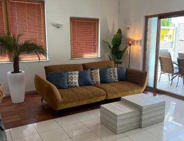 Four-Bedroom Apartment with Balcony 