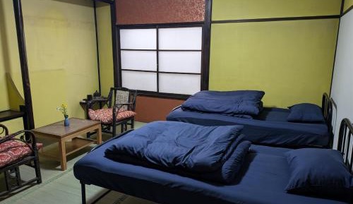 Single Bed in Female Dormitory Room
