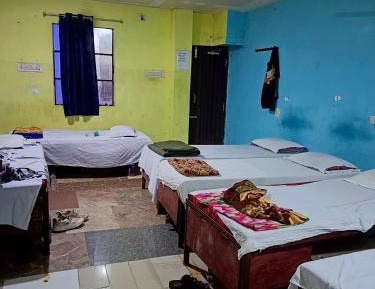 Single Bed in Dormitory Room