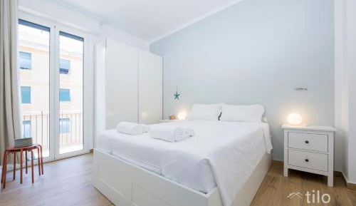 One-Bedroom Apartment with Balcony and City View