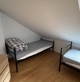 Single Bed in Female Dormitory Room