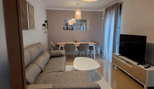 Four-Bedroom Apartment with Balcony 