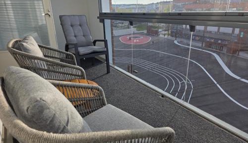 One-Bedroom Apartment with Balcony and City View