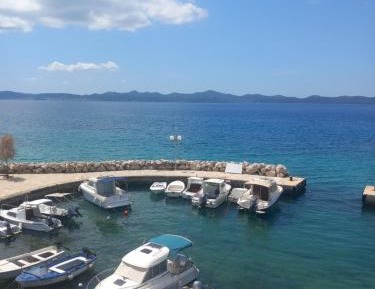 Three-Bedroom Apartment with Sea View