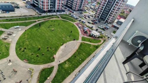 One-Bedroom Apartment with Balcony and City View
