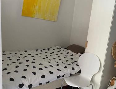 Single Bed in Dormitory Room
