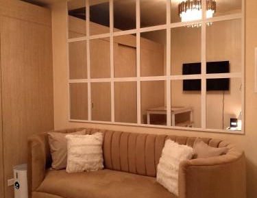 One-Bedroom Apartment with Balcony and City View