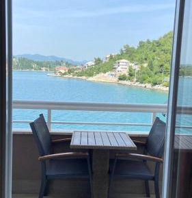 One-Bedroom Apartment with Balcony and Sea View
