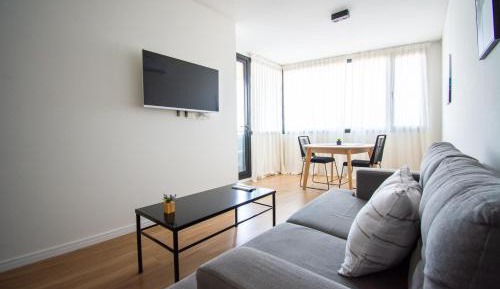 One-Bedroom Apartment with Balcony and City View