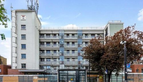 Four-Bedroom Apartment with Balcony 