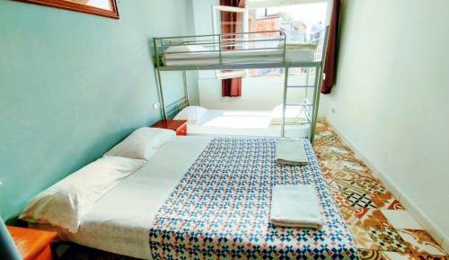 Quadruple Room with Shared Bathroom