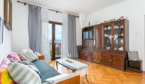 Three-Bedroom Apartment with Terrace and Sea View