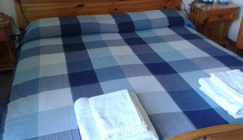 Quadruple Room with Shared Bathroom