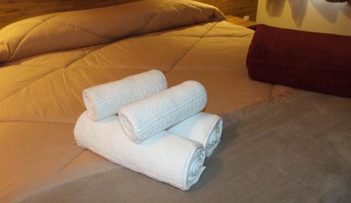 Suíte Dupla com Varanda e Ar-Condicionado