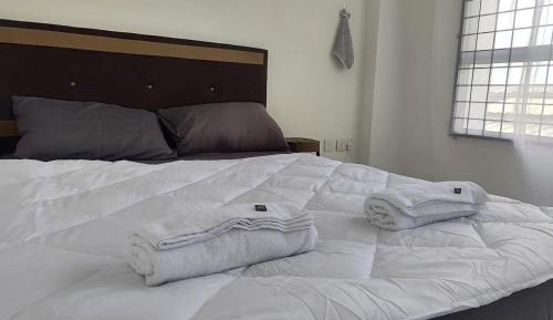 Queen Room with Shared Bathroom