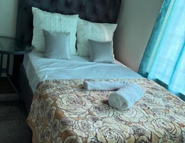 Economy Quadruple Room with Shared Bathroom