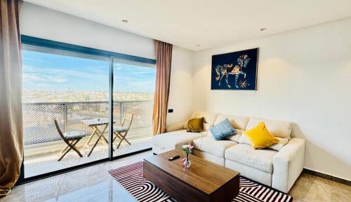 One-Bedroom Apartment with Balcony and City View