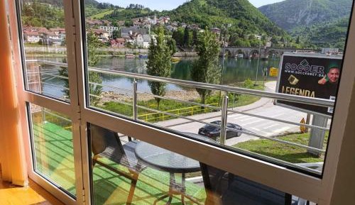 One-Bedroom Apartment with Balcony and City View
