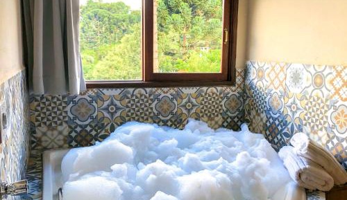 Chalé com Banheira de Hidromassagem