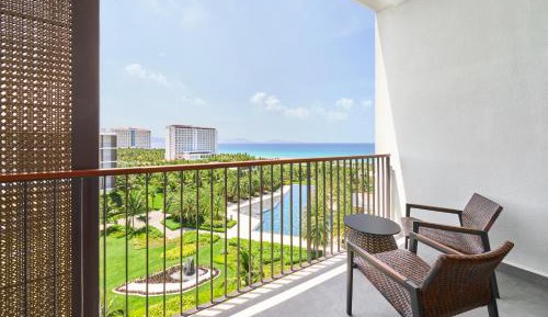 Deluxe Sea View with Two Double Beds and Balcony