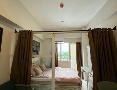 One-Bedroom Apartment with Balcony and City View