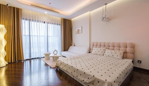 One-Bedroom Apartment with Balcony and City View