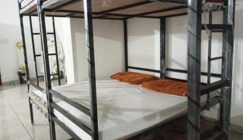 Single Bed in Dormitory Room