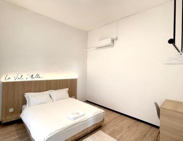 Queen Room with Shared Bathroom