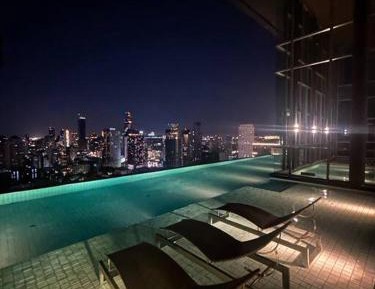 One-Bedroom Apartment with Balcony and City View