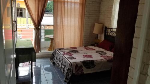 One-Bedroom Apartment with Balcony and City View