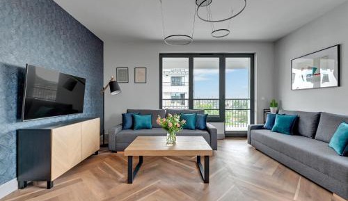 Four-Bedroom Apartment with Balcony 