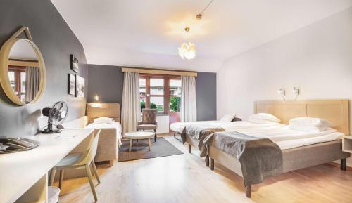 Family Twin Room with Sofa Bed and Roll out Bed