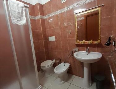 Quadruple Room with Private Bathroom