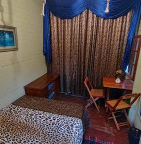 Standard Double Room with Shared Bathroom