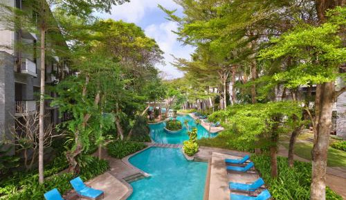One-Bedroom King Suite with Balcony & Pool View