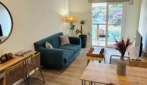 One-Bedroom Apartment with Balcony and City View