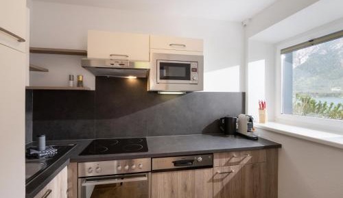  Apartment im Erdgeschoss mit großer Terrasse direkter Seeblick