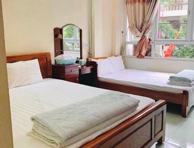 Quadruple Room with Private Bathroom