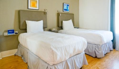 Double Twin Room with Shared Bathroom