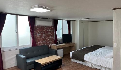 Quadruple Room with Private Bathroom